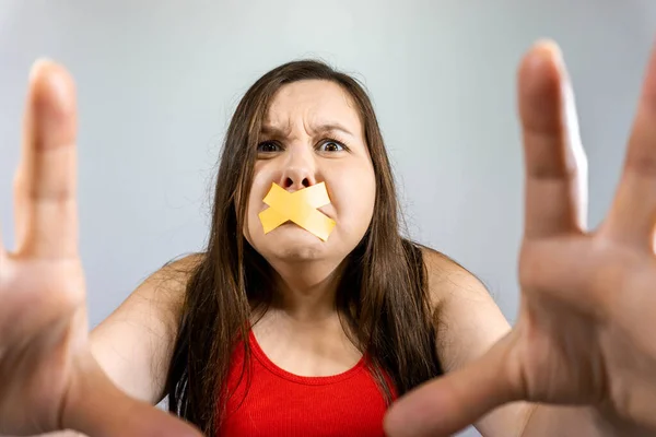Fat girl with excess weight slabed her mouth tape to stop eating.
