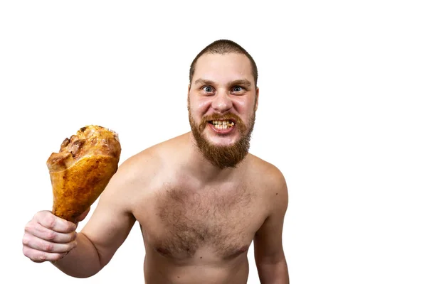 Uomo Tiene Mano Morde Una Carne Enorme Isolata Bianco — Foto Stock