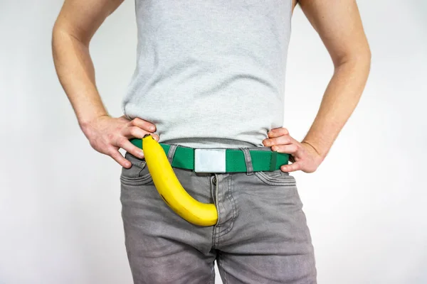 Man Imitates Penis Banana Concept Men Health Potency Large Size — Stockfoto