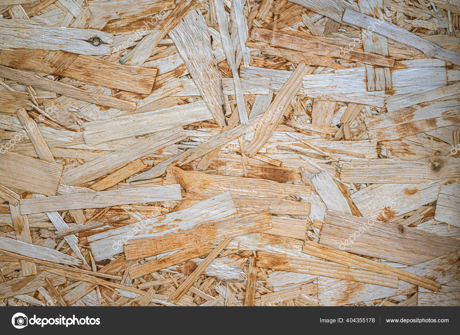 Pressed wood chip board texture. Background of wood chips. Stock