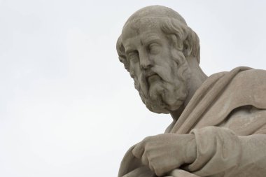 classic statue of Plato from side close up clipart