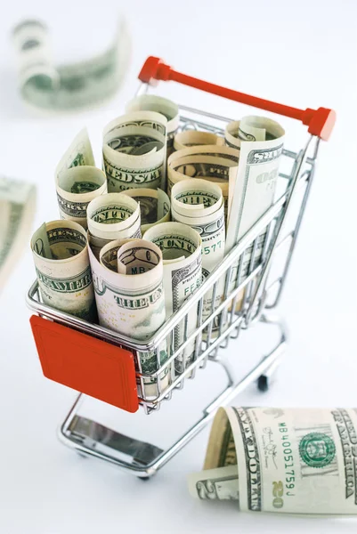 Dollars in a supermarket cart — Stock Photo, Image