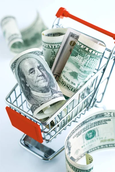 Dollars in a supermarket cart — Stock Photo, Image