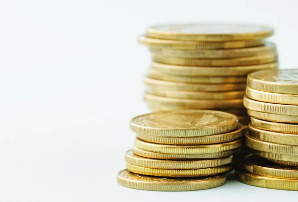 Stacked Piles Gold Coins Different Sizes White Close View Financial — Stock Photo, Image