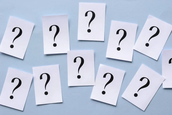 Irregular rows of printed question marks — Stock Photo, Image