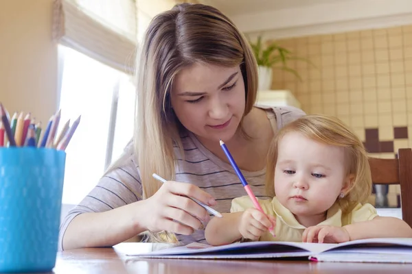 Young girl kid drawing with her sister — Stock Image Young girl kid drawing with her sister Stock Picture