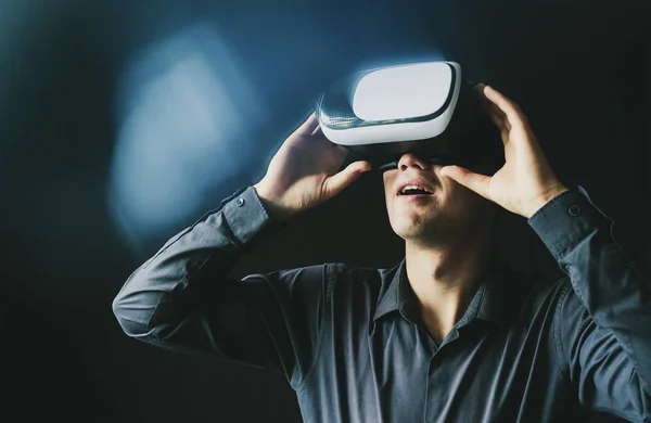 Young man with virtual glasses