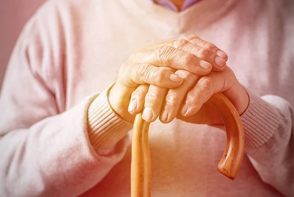 Close Details Folded Hands Elderly Man Resting Walking Cane Mobility — Stock Photo, Image