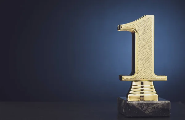 Champion or Winner gold trophy over blue — Stock Photo, Image
