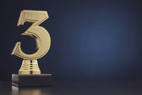 Isolated gold colored statue of number 3 — Stock Photo, Image