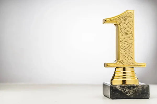 Winners 1st place gold trophy with copy space — Stock Photo, Image