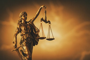 Figure of Justice with sword and scales clipart