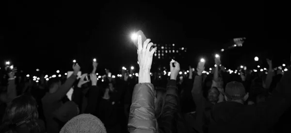 Manifestante Sostiene Una Luz —  Fotos de Stock