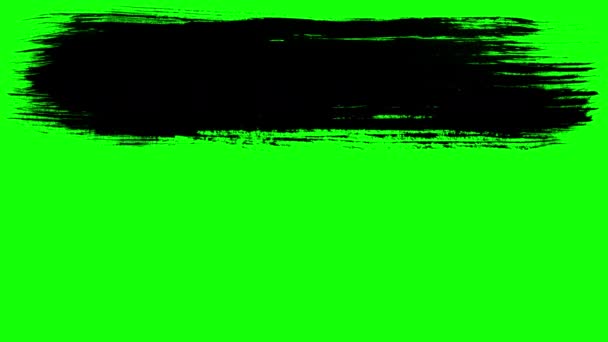 Black strokes of paint brush on green — Stock Video