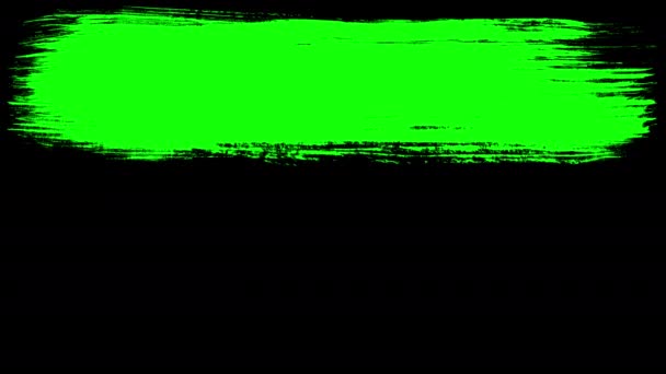 Green strokes of paint brush on black — Stock Video