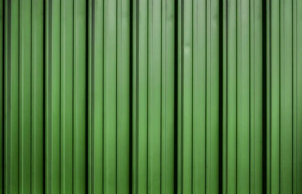 Green corrugated metal sheet texture background