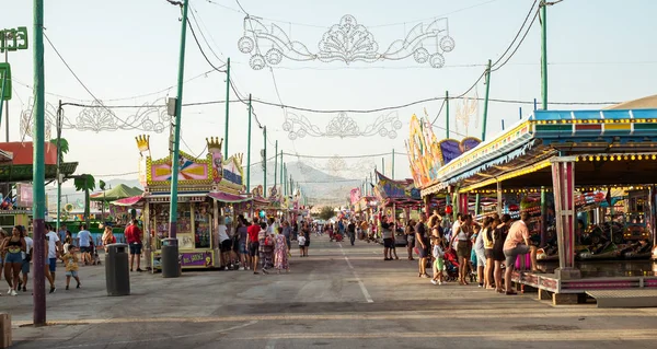 Foto van attracties in Feria de Malaga — Stockfoto