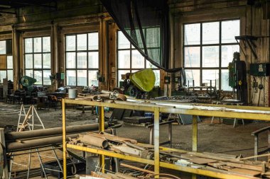 Sibiu, Romania - October 12, 2024. old dusty metalworking workshop