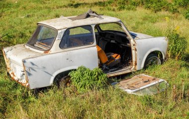 Sibiu, Romania - October 20, 2024.. Trabant car abandoned in the grass