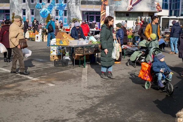 Sibiu, Romania - February 01, 2025. Outdoor Farmers Market in Sibiu with organic produce in a suny day