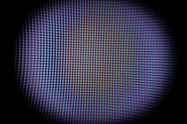 LCD Ekran Pikselleri 'nin yakın çekimi, siyah arkaplanda LED' ler. Parlak bir LED ekranın makro fotoğrafçılığı