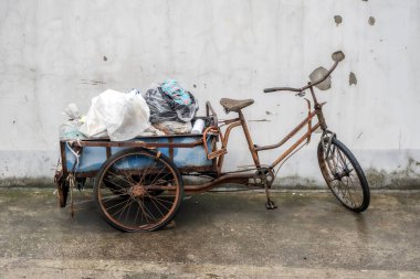 old utility tricycle for transporting goods in Shanghai, China