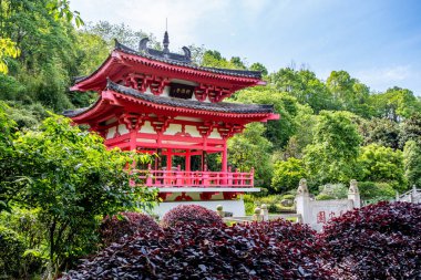 Chongqing, China - May 02, 2025 Chongqing Garden Expo Park is a thoughtfully designed combination of ecological restoration, cultural exhibit, and horticultural artistry, Yubei District Longjing Lake