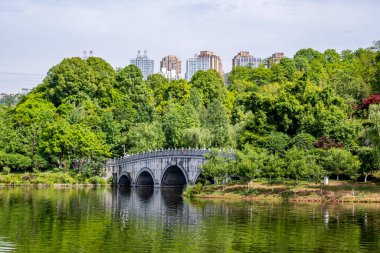 Chongqing, China - May 02, 2025 Chongqing Garden Expo Park is a thoughtfully designed combination of ecological restoration, cultural exhibit, and horticultural artistry, Yubei District Longjing Lake