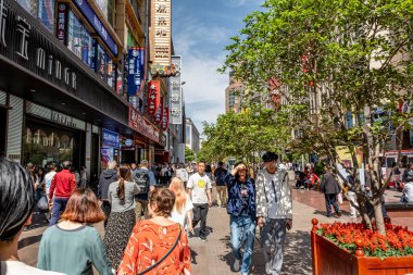 Shanghai, China - April 26 2025 Nanjing Road in Shanghai is a bustling No. 1 commercial street and a main shopping destination, world's longest shopping district with 1M visitors daily