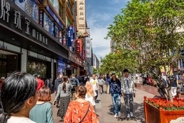 Shanghai, China - April 26 2025 Nanjing Road in Shanghai is a bustling No. 1 commercial street and a main shopping destination, world's longest shopping district with 1M visitors daily