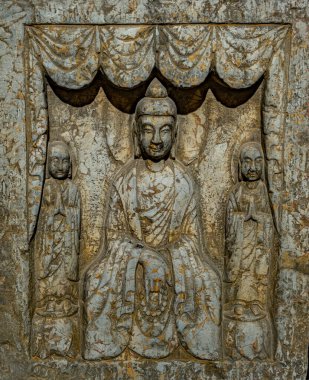 Shanghai, China - May 01 2025. Medieval Chinese Buddhist iconography, from the 6th century