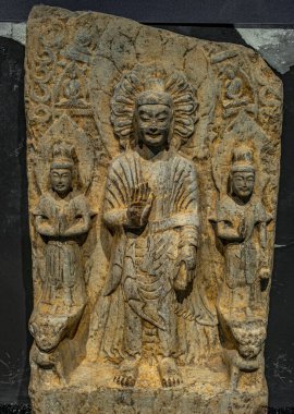 Shanghai, China - May 01 2025. Medieval Chinese Buddhist iconography, from the 6th century