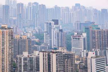 Chongqing, China - May 07, 2025 View from the rooftop of tall buildings in the Chongqing city, Chongqing is a giant city in southwestern China, founded at the confluence of the Yangtze and Jialingjiang rivers, China