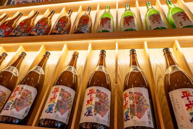Shanghai, China - April 29 2025  Japanese rice wine bottles arranged on shelves