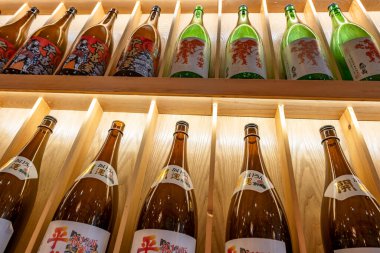 Shanghai, China - April 29 2025  Japanese rice wine bottles arranged on shelves