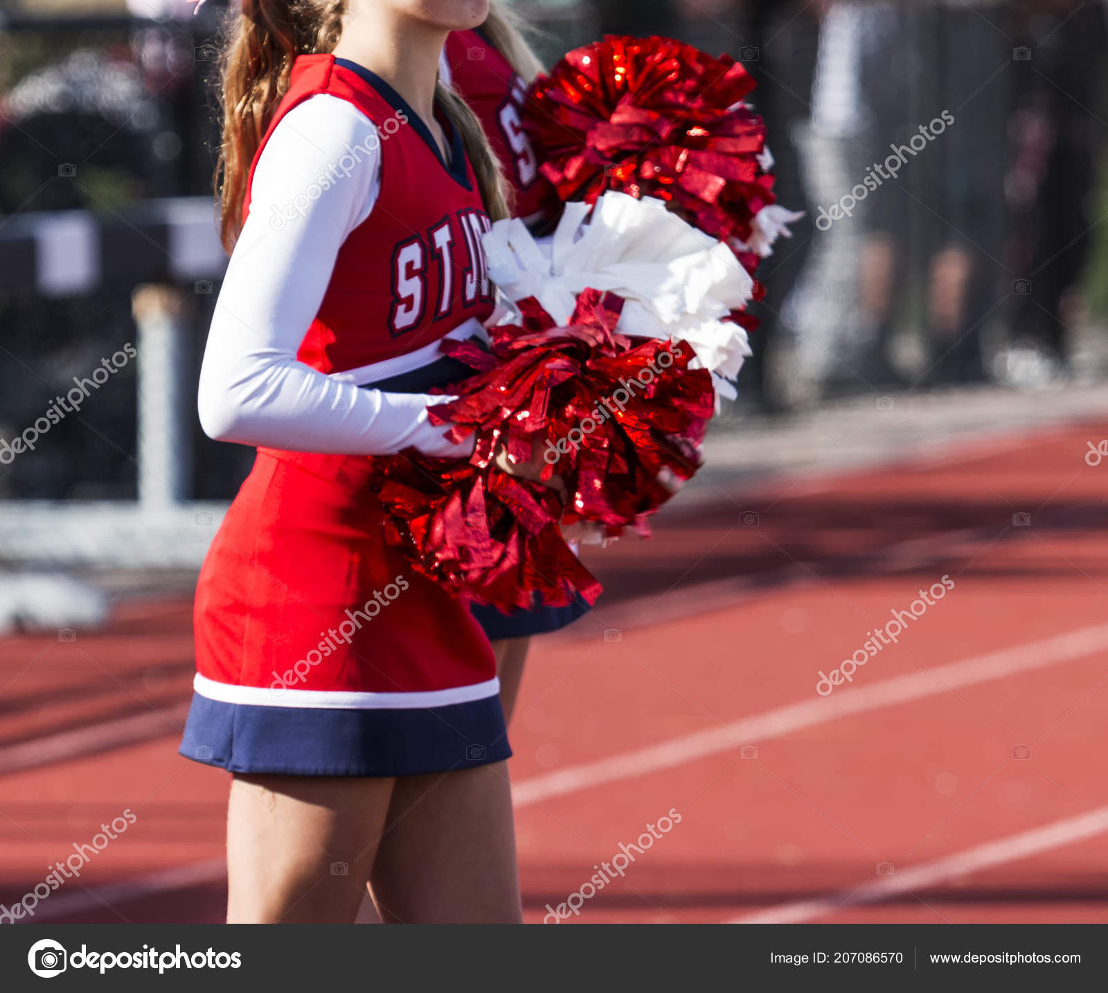 High School Cheeleraders Use Red White Pom Cheering Stock ©WoodysPhotos 207086570