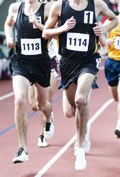 Two High School Boys Same Team Leading Mile Indoor Track — Stock Photo, Image