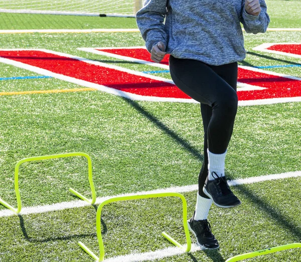 High School Girl Stepping Two Foot Yellow Mini Hurdles Agility — Stock Photo, Image