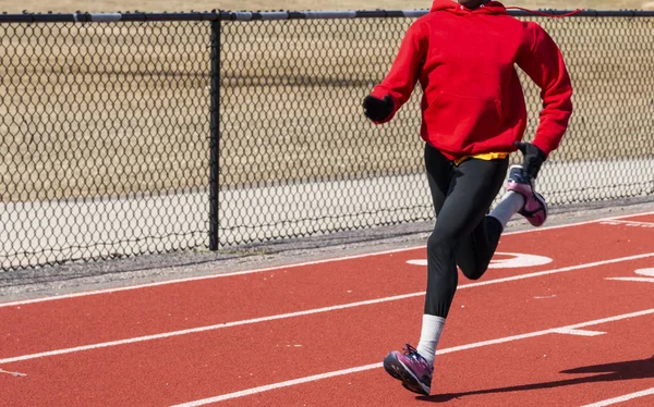 Hızlı bir yolda çalışan sprinter