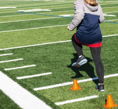 Turuncu koniler üzerinde çalışan