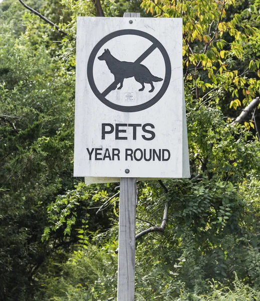 No Pets Allowed Year Round sign