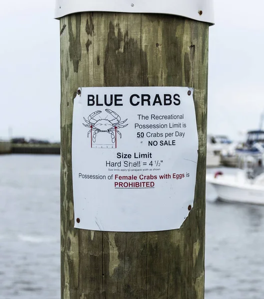 Blauwe klauw krabben recreatieve limiet teken — Stockfoto