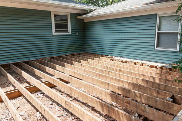 The base is set for a new deck to get composite meterial installed in a backyard.