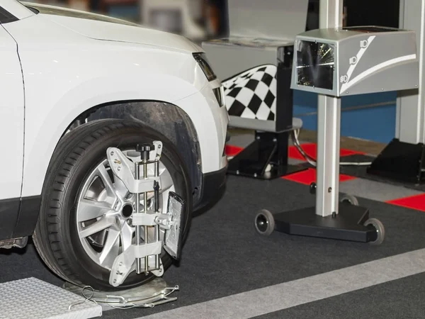 Wheel alignment equipment in a car repair station