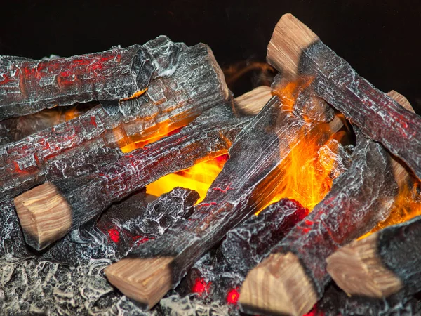 Burning wood in a fire with strong heat