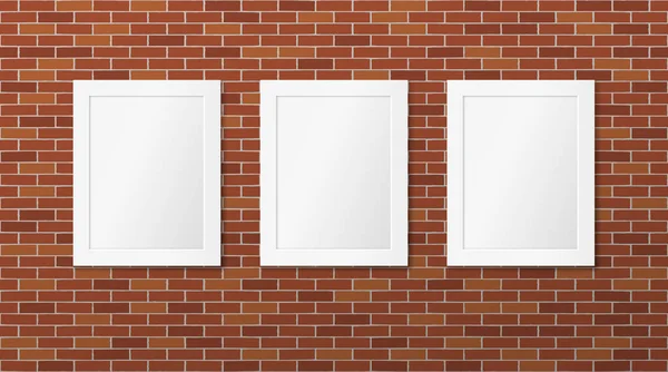 Three white frames on a brick wall. Vector picture frames layout