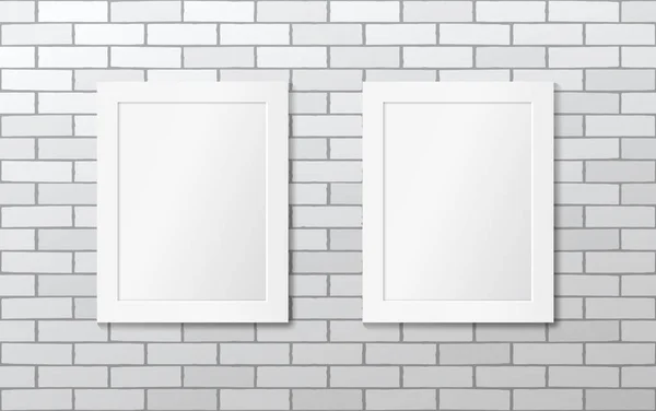 Zwei weiße Bilderrahmen an einer weißen Ziegelwand. Vektor-Attrappe — Stockvektor
