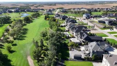 Stunning 4K drone video of Greenbryre Estates featuring upscale homes and the signature golf course community.