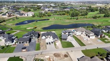 Stunning 4K drone video of Greenbryre Estates featuring upscale homes and the signature golf course community.