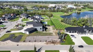 Stunning 4K drone video of Greenbryre Estates featuring upscale homes and the signature golf course community.